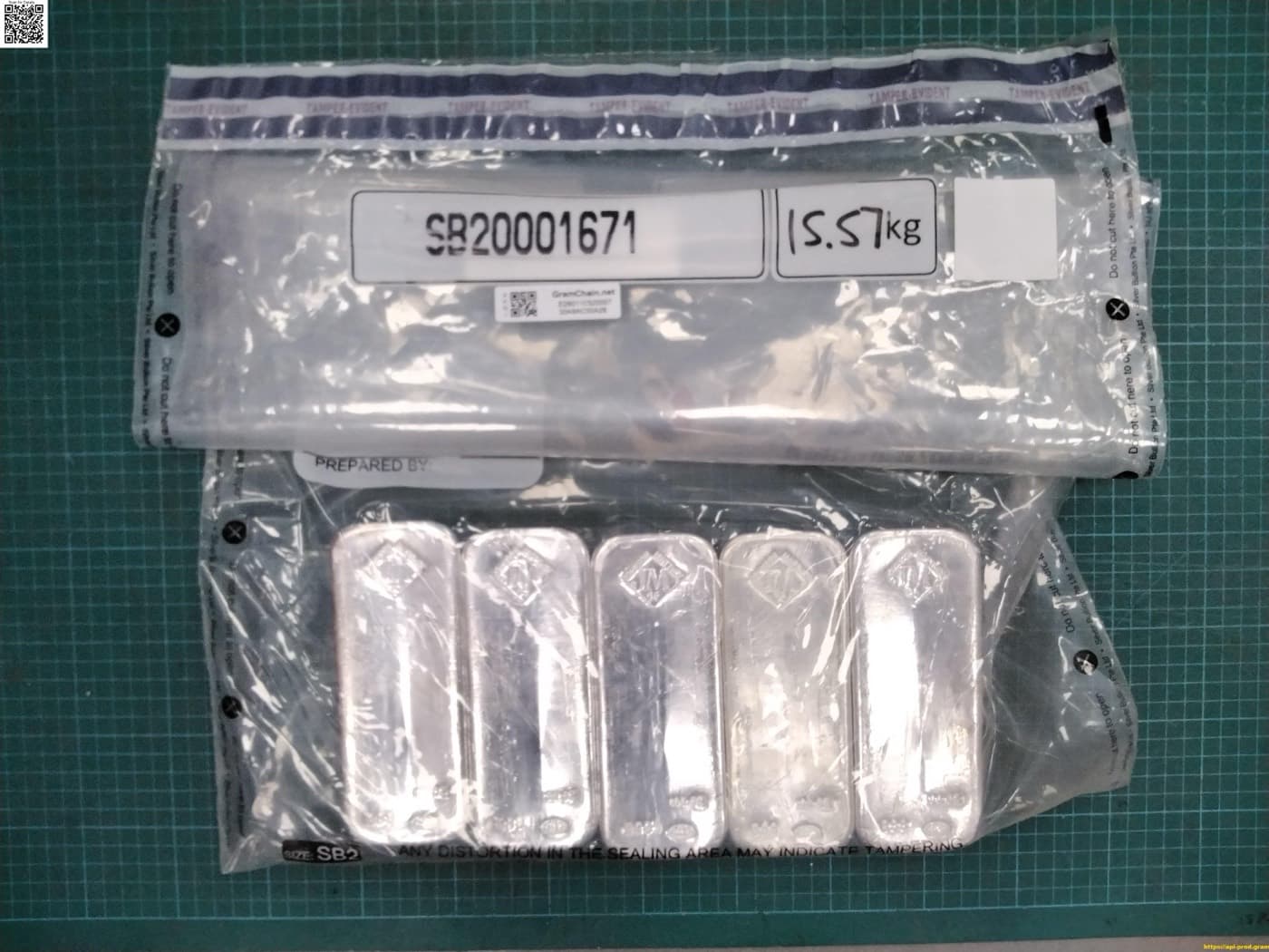 Five 100 troy ounce Johnson Matthey silver bars, parcel SB20001671, photographed on intake at The Safe House